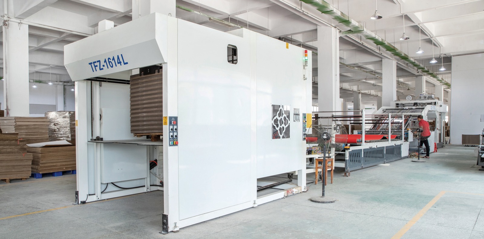 High-speed automated flute laminator