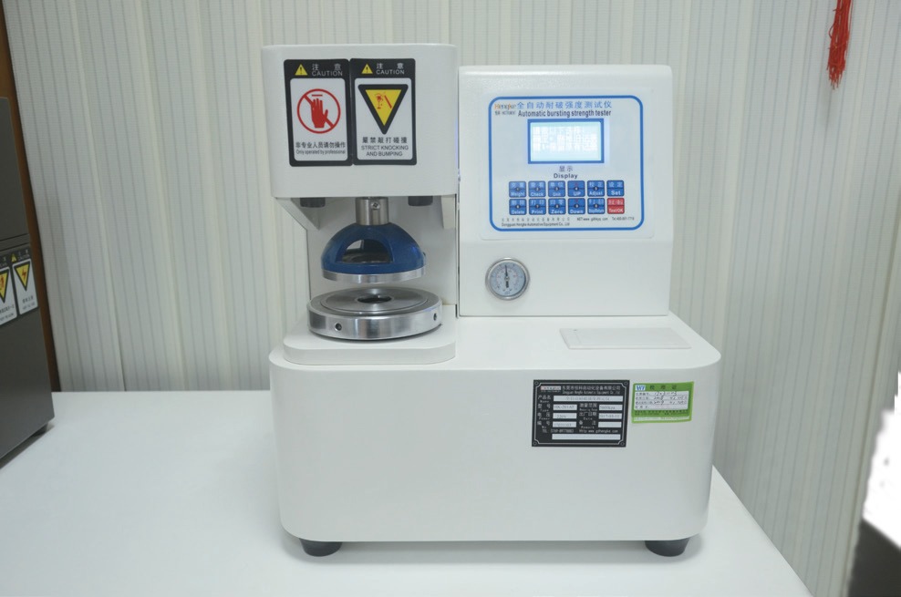 Burst strength tester for paperboard packaging